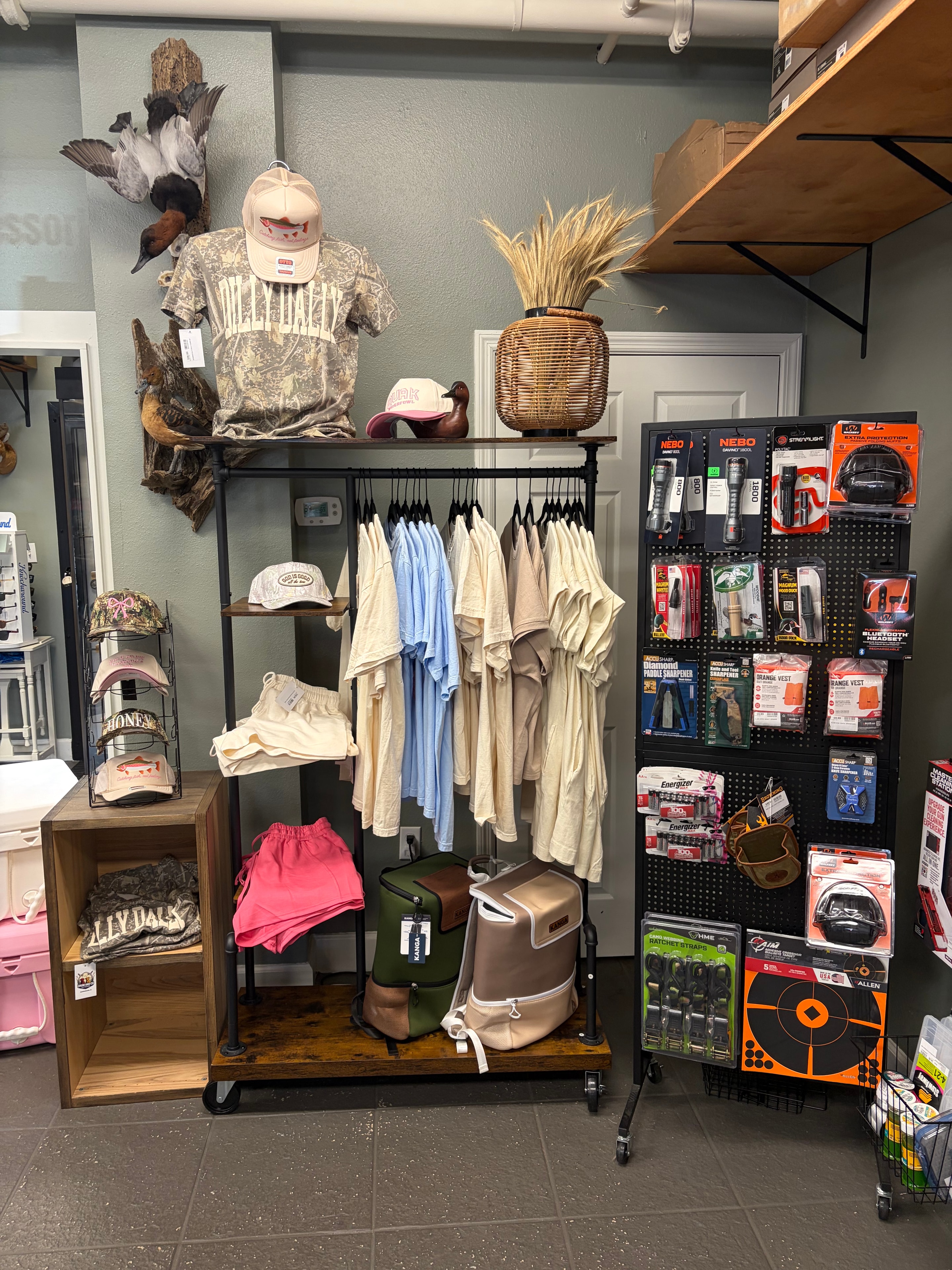 Clothing racks with outdoor and hunting apparel
